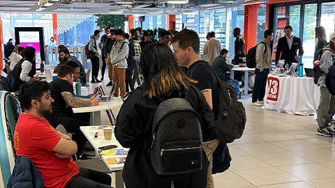 An image of students and employers at the Loughborough University London job fair